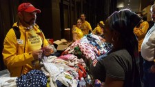 Scientology Volunteer Ministers helping people displaced by Hurricane Harvey at Houston's Lakewood Church