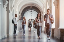 Students Walking in a College Corridor