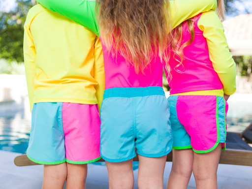 RuffleButts' Future is Bright With New Neon Swim Collection for the Whole Family